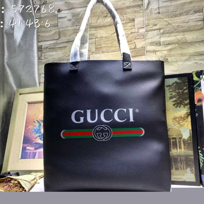 G*u*i shopping bags